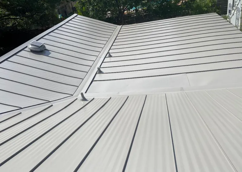 Solar attic fan installed on a metal roof for Roof Ventilation in Mount Arlington